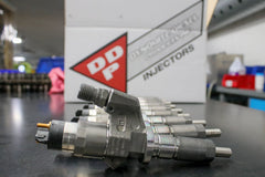 Dynomite Diesel Duramax 01-04 LB7 Reman Injector Set 100 Percent Over SAC Nozzle DDPLB7-200