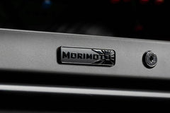 Morimoto Badge: Morimoto (Black Chrome) SH042