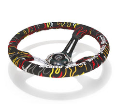 NRG Innovations Reinforced Steering Wheel - Ryan Litteral Signature  3" Deep, 5 mm chrome spoke with slit spokes. Black Alcantara, Red Stitching, Flame Embroidery"Scare Money Don't Make Money" Finish. RST-018CH-RLB
