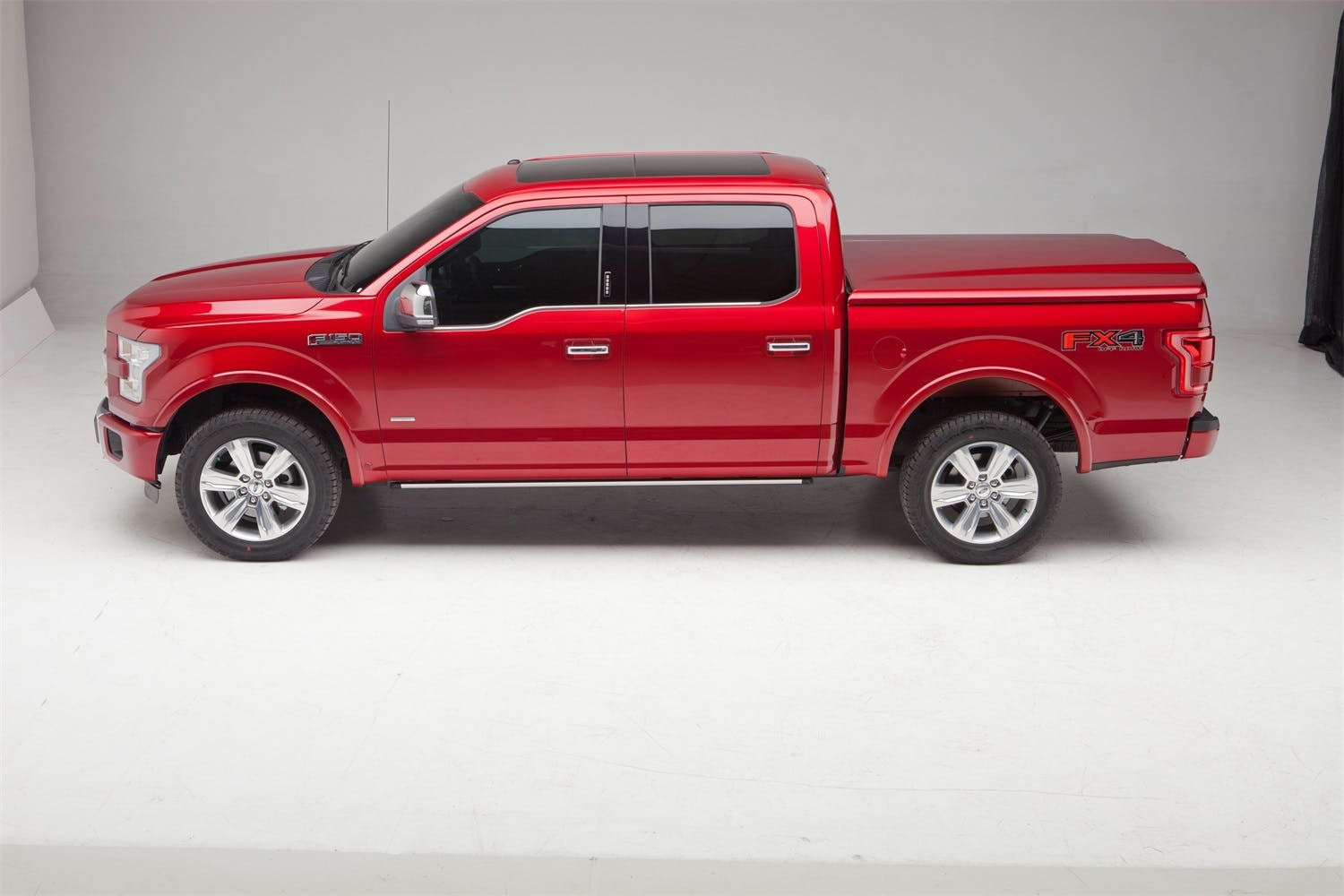 UnderCover UC1158S Elite Smooth Tonneau Cover, Smooth Gray Finish, Must Be Painted