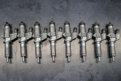 Dynomite Diesel Duramax 01-04 LB7 Reman Injector Set 150 Percent Over SAC Nozzles DDPLB7-300
